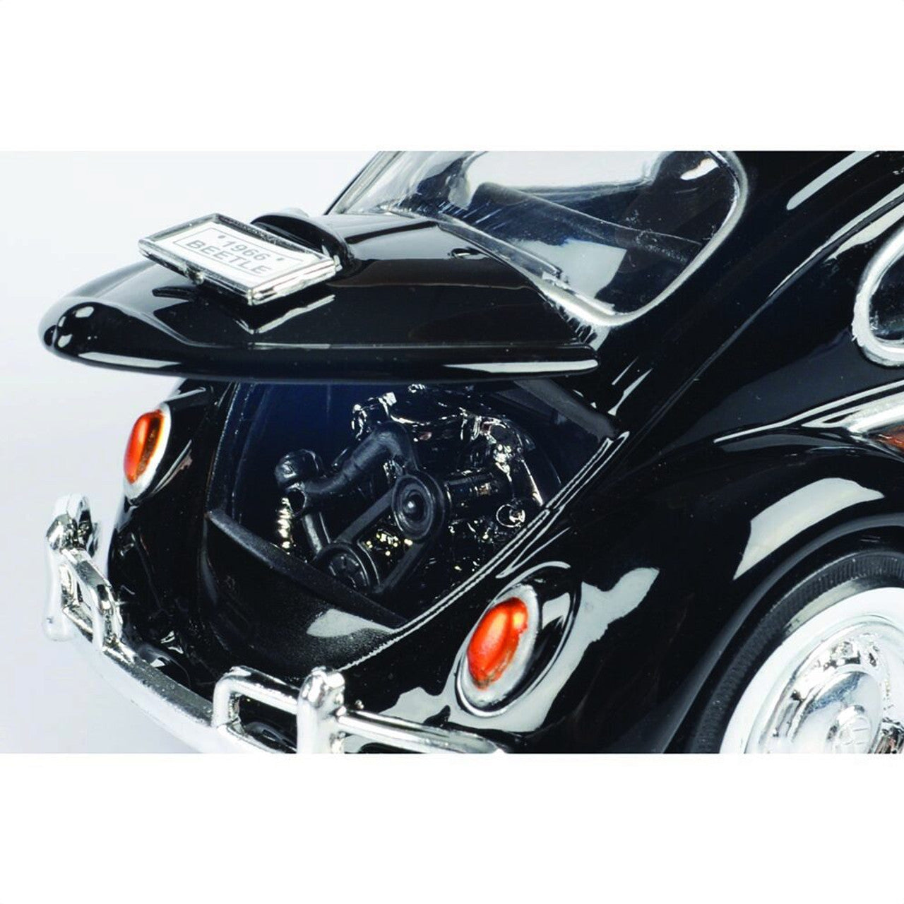 Volkswagen Beetle with Surfboard - Black 1:24 Scale Diecast Model Car by Motormax