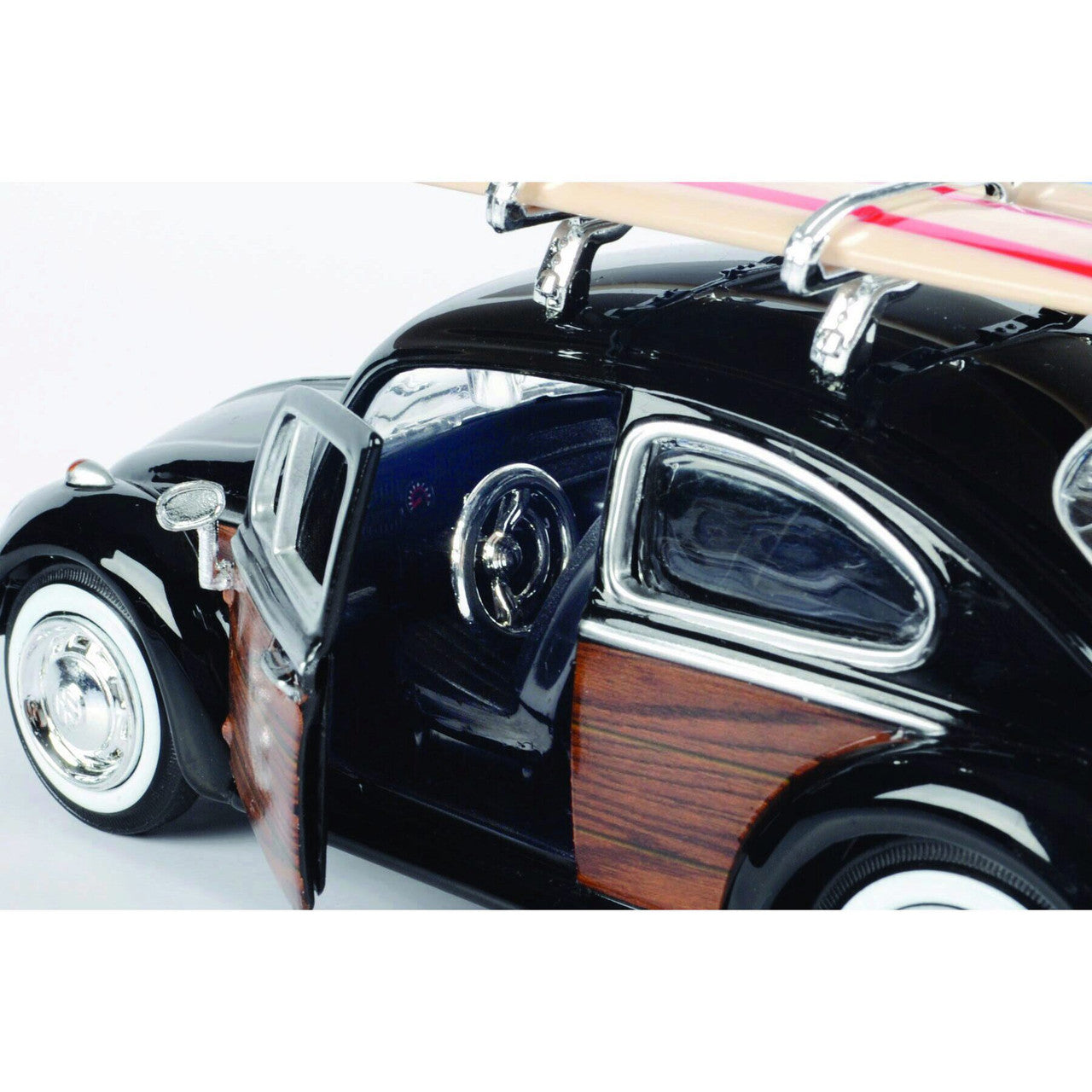 Volkswagen Beetle with Surfboard - Black 1:24 Scale Diecast Model Car by Motormax
