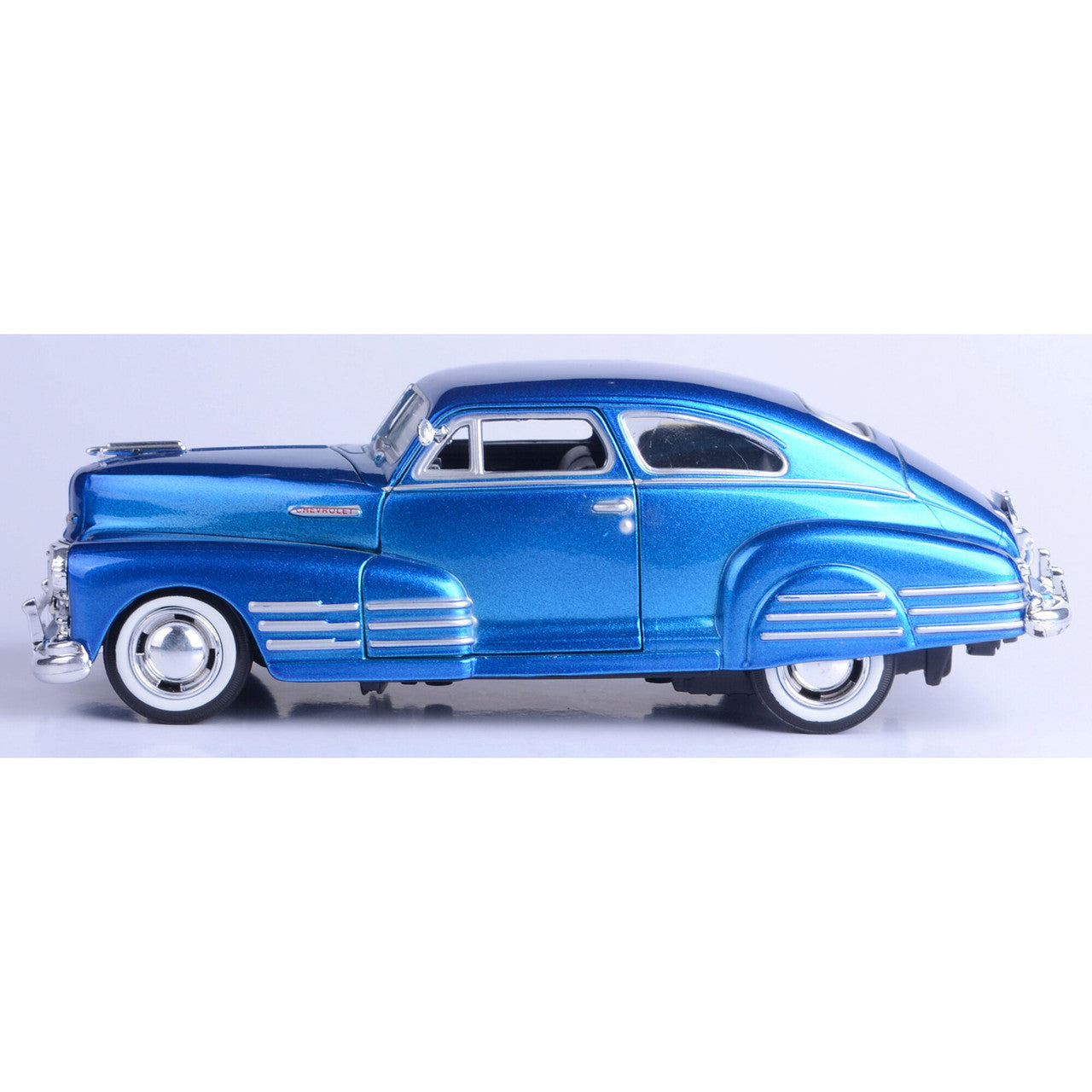 1948 Chevy Aerosedan Fleetline - Metallic Blue 1:24 Scale Diecast Model Car by Motormax